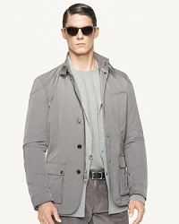 A sleek interpretation of a traditional gentleman's essential, the Tech Moto Sport Coat channels authentic biker style with its streamlined silhouette and luxe hardware. A sleek interpretation of a traditional gentleman's essential, the Tech Moto Sport Coat channels authentic biker style with its streamlined silhouette and luxe hardware.
