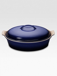 Crafted from heavy stoneware, Le Creuset cookware is the ultimate ingredient for chefs and home cooks worldwide. With its secure lid, this covered casserole is a convenient choice for transporting dishes to parties and picnics. Not only does the lid provide an effective moisture and heat lock for the dish, but it prevents spills and protects its contents. Crafted from heavy stoneware, Le Creuset cookware is the ultimate ingredient for chefs and home cooks worldwide. With its secure lid, this covered casserole is a convenient choice for transporting dishes to parties and picnics. Not only does the lid provide an effective moisture and heat lock for the dish, but it prevents spills and protects its contents.