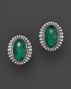 A fluted edge in sterling silver frames a faceted malachite doublet. From Lagos.
