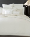 Silky softness. Complete your Modern Classics White Gold bed from Donna Karan with this plush quilt, crafted of luxuriant silk in a soothing white colorway.