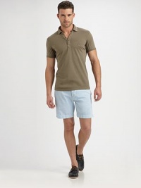 A slim-fitting classic polo with chest logo detail.Four-button placketCottonMachine washImported A slim-fitting classic polo with chest logo detail.Four-button placketCottonMachine washImported