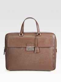Textured saffiano leather briefcase with front pocket and push lock detail.Zip closureDouble top handlesExterior, interior pocketsLeather16W x 12H x 2DMade in Italy Textured saffiano leather briefcase with front pocket and push lock detail.Zip closureDouble top handlesExterior, interior pocketsLeather16W x 12H x 2DMade in Italy