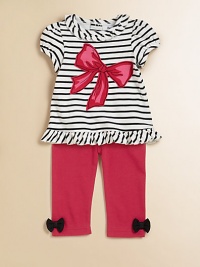 A pretty striped tunic is embellished with a bold bow and paired with soft, stretch-cotton pants to create a timelessly sweet look. Top Ruffled round necklineShort puff sleevesBack snapsRuffled hem Pants Elastic hemCottonMachine washImported Please note: Number of snaps may vary depending on size ordered A pretty striped tunic is embellished with a bold bow and paired with soft, stretch-cotton pants to create a timelessly sweet look. Top Ruffled round necklineShort puff sleevesBack snapsRuffled hem Pants Elastic hemCottonMachine washImported Please note: Number of snaps may vary depending on size ordered