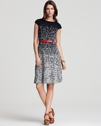 Downtown cool meets uptown chic in this Anne Klein Dress printed dress, complete with a glossy red belt for the finishing polish. Downtown cool meets uptown chic in this Anne Klein Dress printed dress, complete with a glossy red belt for the finishing polish.