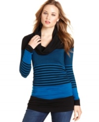 Go long! It's Our Time's striped sweater tunic features a cowl neck for classic style and the perfect length for wearing with leggings. Go long! It's Our Time's striped sweater tunic features a cowl neck for classic style and the perfect length for wearing with leggings.