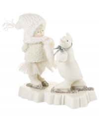Crafted of pure porcelain bisque, this adorable Snowbaby is dressed for the weather as she dances and skates with a penguin friend in this timeless figurine from Department 56. Crafted of pure porcelain bisque, this adorable Snowbaby is dressed for the weather as she dances and skates with a penguin friend in this timeless figurine from Department 56.