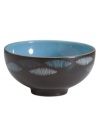 A handsome addition to casual dining, the Sienna rice bowl features a matte mocha surface with shimmering ellipses and a glazed blue interior.