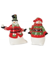 Play up the winter cheer around your table with Fitz and Floyd's snowman salt and pepper shakers. Festively dressed and with a snowball in hand, this whimsical set brightens any holiday scene. Play up the winter cheer around your table with Fitz and Floyd's snowman salt and pepper shakers. Festively dressed and with a snowball in hand, this whimsical set brightens any holiday scene.