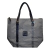 Waterproof treatment given to bag for more durability. Features leather trim and zip top closure. Outside zipper pocket.