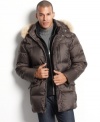 Pack on big style and warm comfort in this Marc New York parka with a fur-trimmed, removable hood.