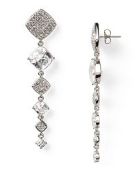 Shape meets sparkle on these silvery drop earrings from Lora Paolo, featuring cushion cut crystals. This pair's timeless design perfects elegant evening accessorizing. Shape meets sparkle on these silvery drop earrings from Lora Paolo, featuring cushion cut crystals. This pair's timeless design perfects elegant evening accessorizing.