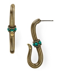 These sinuous Giles & Brother earrings are cast in antiqued brass, perfectly capturing the nautical trend with bit of industrial, downtown grit. These sinuous Giles & Brother earrings are cast in antiqued brass, perfectly capturing the nautical trend with bit of industrial, downtown grit.