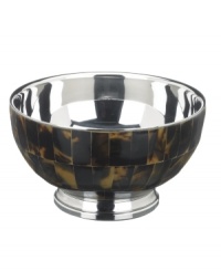 The alluring beauty of multi-faceted tortoiseshell presents a warm accent to clean stainless steel in this refined nut bowl from Lauren by Ralph Lauren. The alluring beauty of multi-faceted tortoiseshell presents a warm accent to clean stainless steel in this refined nut bowl from Lauren by Ralph Lauren.