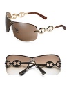 Rimless three-piece mount with marina chain temple. Available in gold frames with brown lens and chocolate frames with gray lens. Metal Made in Italy 