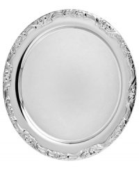 Engraved with a scrolling floral motif, this traditional Godinger tray takes center stage at elegant dining occasions. With a defined rim and sculpted edge, it all adds up to one brilliant serving piece. Engraved with a scrolling floral motif, this traditional Godinger tray takes center stage at elegant dining occasions. With a defined rim and sculpted edge, it all adds up to one brilliant serving piece.