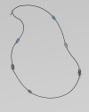 From the Cable Wrap Collection. A graceful design with faceted, marquis-shaped Hampton blue topaz stones wrapped and set in elegant, blackened sterling silver on a box link chain. Hampton blue topazBlackened sterling silverLength, about 38Lobster clasp closureImported 