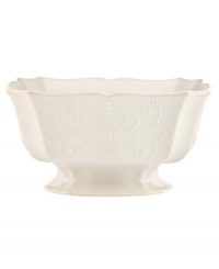 With fanciful beading and a feminine shape, this centerpiece bowl from the Lenox French Perle dinnerware collection has an irresistibly old-fashioned sensibility. Hard-wearing stoneware is dishwasher safe and, in a soft white hue with antiqued trim, a graceful addition to every meal. With fanciful beading and a feminine shape, this centerpiece bowl from the Lenox French Perle dinnerware collection has an irresistibly old-fashioned sensibility. Hard-wearing stoneware is dishwasher safe and, in a soft white hue with antiqued trim, a graceful addition to every meal.