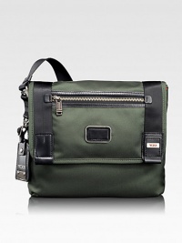 A slim and simple bag that's ideal for everyday outings and out-of-town travel alike in durable ballistic nylon. Flap closure Adjustable shoulder strap Exterior zip, organizational pockets Interior zip, slip pockets Nylon with leather accents 11½W X 10H X 3D Imported A slim and simple bag that's ideal for everyday outings and out-of-town travel alike in durable ballistic nylon. Flap closure Adjustable shoulder strap Exterior zip, organizational pockets Interior zip, slip pockets Nylon with leather accents 11½W X 10H X 3D Imported
