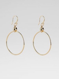 From the Marina Collection. A polished, tubular hoop suspends from a distinctively sculpted link. 18k yellow gold Diameter, about 1½ Ear wire Made in Italy From the Marina Collection. A polished, tubular hoop suspends from a distinctively sculpted link. 18k yellow gold Diameter, about 1½ Ear wire Made in Italy