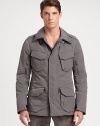 This jacket is skillfully crafted in a slim, contemporary silhouette from water-repellent microfiber for a modern, utilitarian-inspired vibe.Zip frontStand collarShoulder epaulettesOversized chest, waist flap pocketsZippered pockets at sleeveFully linedAbout 31 from shoulder to hem90% polyester/10% polyurethaneDry cleanImported