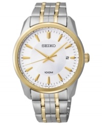 Golden accents create a sophisticated look on this dress watch from Seiko. Golden accents create a sophisticated look on this dress watch from Seiko.