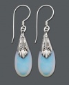 Embrace your individuality with unique design. Earrings by Jody Coyote feature iridescent glass teardrops in an intricate sterling silver setting. Approximate drop: 1-1/2 inches.