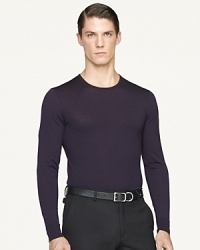 A handsome crewneck sweater is constructed from smooth Italian wool and fine-tailored for a trim silhouette. A handsome crewneck sweater is constructed from smooth Italian wool and fine-tailored for a trim silhouette.