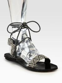 Two-tone raffia straps cross the foot, finishing with braided leather tassel ties that travel up the ankle. Metallic leather and raffia upperLeather lining and solePadded insoleImported Two-tone raffia straps cross the foot, finishing with braided leather tassel ties that travel up the ankle. Metallic leather and raffia upperLeather lining and solePadded insoleImported