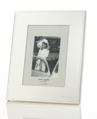 Polished to a lustrous mirror-like finish, this elegant and simple frame is crafted in silver-plated metal, making your most magical moments shine even more. With Mr. & Mrs. engraved in the bottom right corner. Polished to a lustrous mirror-like finish, this elegant and simple frame is crafted in silver-plated metal, making your most magical moments shine even more. With Mr. & Mrs. engraved in the bottom right corner.