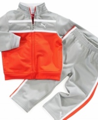 He'll win the cuteness race in this cool and colorful Puma track jacket and pants set. He'll win the cuteness race in this cool and colorful Puma track jacket and pants set.