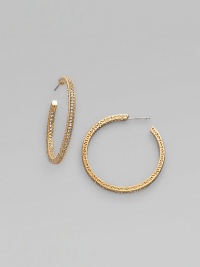 EXCLUSIVELY AT SAKS. Feminine filigree hoops, with dazzling pavé-set crystals. Crystal 18k goldplated Diameter, about 1½ Post back Imported