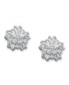 Star light star bright. These dazzling starburst-shaped stud earrings combine round and baguette-cut diamonds (1/5 ct. t.w.) in a sterling silver setting. Approximate diameter: 1/3 inch x 1/5 inch.