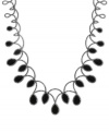 Onyx gets the teardrop treatment to glamorous effect. Genevieve & Grace's necklace, set in sterling silver, also features marcasite to enhance the appeal. Approximate length: 17 inches. Approximate drop: 1-3/8 inches.