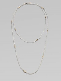 A long-enough-to-double sterling silver chain, delicately spaced with clusters of tiny, faceted 14k gold beads.14k yellow gold and sterling silverLength, about 40Spring ring claspMade in USA A long-enough-to-double sterling silver chain, delicately spaced with clusters of tiny, faceted 14k gold beads.14k yellow gold and sterling silverLength, about 40Spring ring claspMade in USA