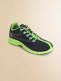 This stylish sneaker features bold colors and functional construction for the perfect sporty shoe.Lace-upCanvas upperPolyester liningRubber solePadded insoleImported This stylish sneaker features bold colors and functional construction for the perfect sporty shoe.Lace-upCanvas upperPolyester liningRubber solePadded insoleImported