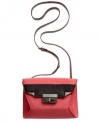 Add a pretty pop of color to your everyday accessorizing with this compact crossbody from RACHEL Rachel Roy. Outfitted with signature hardware and colorblock detailing, it's perfectly sized to stash wallet, phone and makeup.