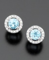 Elevate your style with twinkling round-cut aquamarine (3/8 ct. t.w.) stud earrings surrounded by round-cut diamonds (1/10 ct. t.w.). Set in 14k white gold.