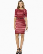 Slim sailor stripes and anchor-embossed buttons give a seafaring spirit to a fine-ribbed cotton dress, accented with a rope belt at the waist for a chic finishing touch.