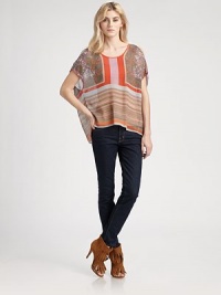 Vibrant florals and woodgrain stripes add a touch of bohemian chic to this breezy topper.ScoopneckOpen shouldersShort sleevesContour hemAbout 28 from shoulder to hemPolyesterDry cleanMade in USA of imported fabricModel shown is 5'11 (180cm) wearing US size Small. Vibrant florals and woodgrain stripes add a touch of bohemian chic to this breezy topper.ScoopneckOpen shouldersShort sleevesContour hemAbout 28 from shoulder to hemPolyesterDry cleanMade in USA of imported fabricModel shown is 5'11 (180cm) wearing US size Small.