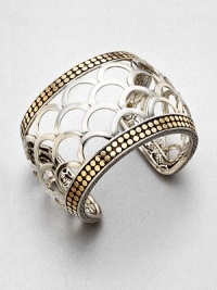 From the Naga Collection. Sleek sterling silver in a stunning cut-out, scale design accented with a radiant 18k gold, dotted border, made in an eco-friendly compound in the heart of Bali. Sterling silver18k goldDiameter, about 2.16Slip-on styleMade in Indonesia From the Naga Collection. Sleek sterling silver in a stunning cut-out, scale design accented with a radiant 18k gold, dotted border, made in an eco-friendly compound in the heart of Bali. Sterling silver18k goldDiameter, about 2.16Slip-on styleMade in Indonesia