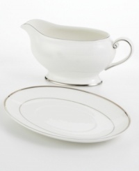 Bright fine china is simply adorned with a band of platinum for an unforgettably elegant table. The Cameo Platinum design from Mikasa's dinnerware and dishes collection is perfect for formal dinners, teas, and luncheons. This gravy boat's delicate, flowing lines add a graceful touch to your table. Bright fine china is simply adorned with a band of platinum for an unforgettably elegant table. The Cameo Platinum design from Mikasa's dinnerware and dishes collection is perfect for formal dinners, teas, and luncheons. This gravy boat's delicate, flowing lines add a graceful touch to your table.