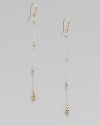 Gracefully dangling strands of sterling silver chain, sprinkled and tipped with glowing faceted beads of 14k gold.14k yellow gold and sterling silverLength, about 2¼Ear wireMade in USA