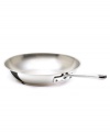 One size for all! The cornerstone of your successful kitchen, Emeril's fry pan brings versatility to your range with a heavy-gauge stainless steel construction perfect for whipping up eggs, bacon or a quick chicken sauté. The innovative bottom features a blend of stainless steel and aluminum with a stunning copper ring. Lifetime warranty. (Clearance)