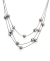The lightweight look of Alfani's three-row illusion necklace is anchored by spherical shaped details. Made in hematite tone mixed metal. Approximate length: 20 inches + 3-1/2-inch extender. Approximate drop: 4-1/2 inches.