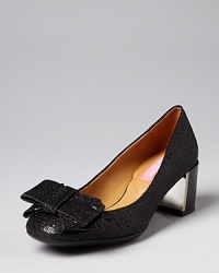 Glittering, bow-accented toes, metallic heel accents: The end result sparkles; by Isaac Mizrahi New York. Glittering, bow-accented toes, metallic heel accents: The end result sparkles; by Isaac Mizrahi New York.