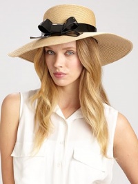 A charming design with a glossy bow accent to keep the sun out of your eyes. PolyesterBrim, about 4Imported