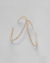 EXCLUSIVELY AT SAKS. Delicate yet dazzling, these brilliant hoops are encrusted with crystals. 18k goldplated Diameter, about 2¼ Stainless steel post back Imported