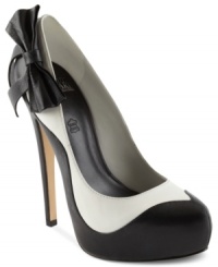 Classic colors, classic style. Truth or Dare's Peavey platform pumps feature a black and white design with an eye-catching black bow on the side heel. Classic colors, classic style. Truth or Dare's Peavey platform pumps feature a black and white design with an eye-catching black bow on the side heel.