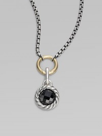 A richly faceted black onyx in a graceful cable frame makes an elegant addition to your own necklace or bracelet. Black onyx Sterling silver Diameter, about ½ Spring clip clasp Made in USA Please note: Necklace sold separately.