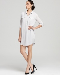Access effortless elegance with this James Perse dress that flaunts a casual henley-style front in a flowy shirtdress silhouette--belt it for cinched-in chic. Access effortless elegance with this James Perse dress that flaunts a casual henley-style front in a flowy shirtdress silhouette--belt it for cinched-in chic.
